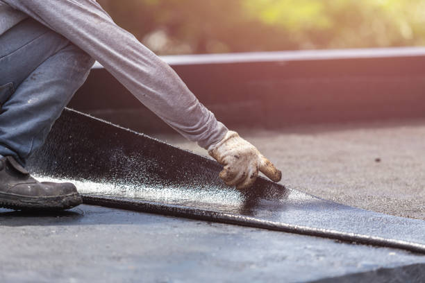 Professional Waterproofing technician working in Spencerville, MD